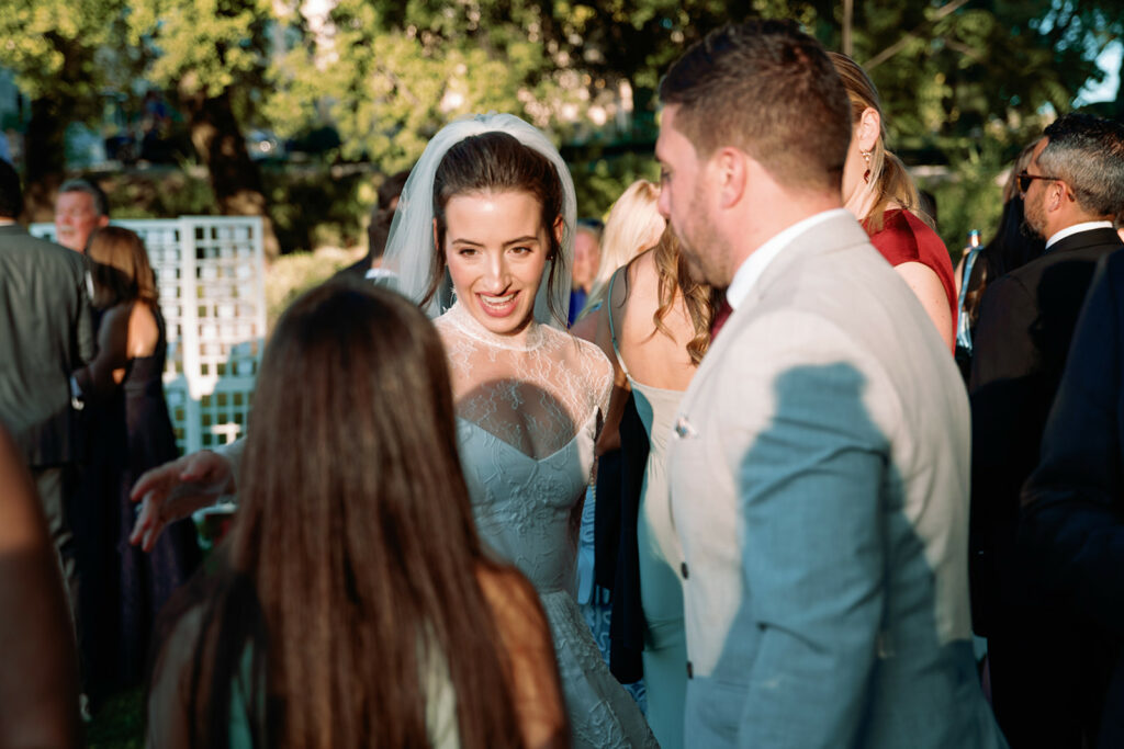 grooms chat with guests