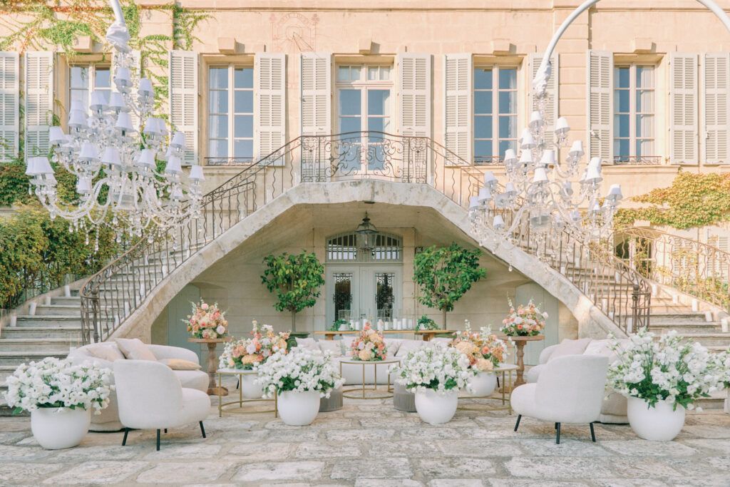 Intimate wedding venue at Chateau d'Estoublon in Provence, showing historic 1489 estate with vineyards and manicured gardens perfect for South of France elopements