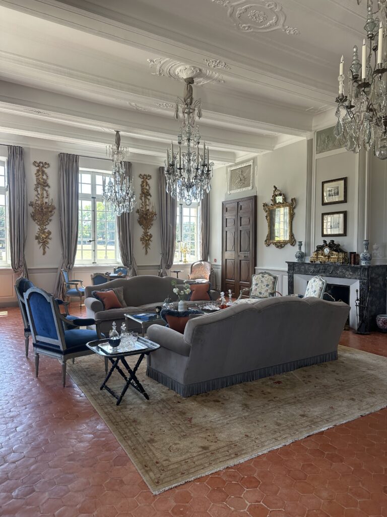 Elegant guest room at Villa Baulieu wedding venue with French garden views