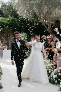 Luxury destination wedding ceremony setup in French Riviera with garden vibes.