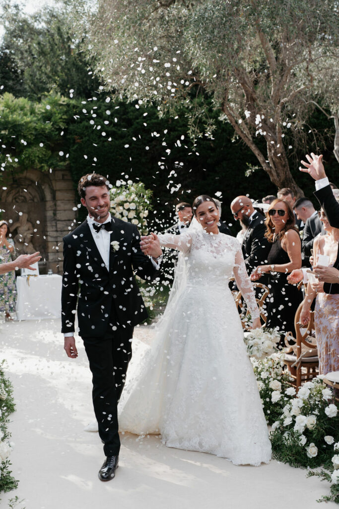 Luxury destination wedding ceremony setup in French Riviera with garden vibes.