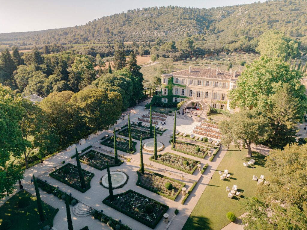 Chateau d'Estoublon wedding ceremony in Provence, the main courtyard for a dinner set up