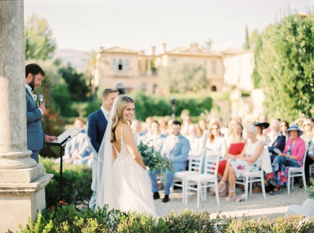 what to ask your wedding planner before booking "Luxury wedding planner consultation with couple planning destination wedding