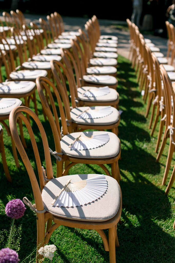 Perfect line of wooden chairs for this outdoor 3 day wedding celebration in Provence at Villa Baulieu
