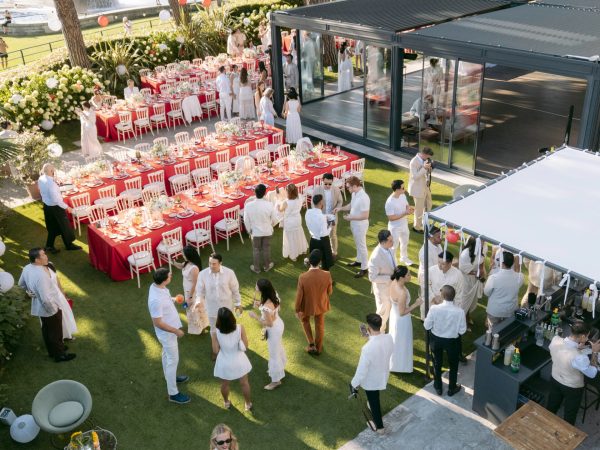 Asian Traditional party  all red and white. Dress code for guests is white here, with the red for the Bride
