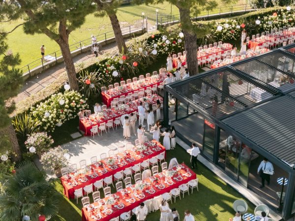 Asian Traditional party  all red and white. Dress code for guests is white here, with the red for the Bride